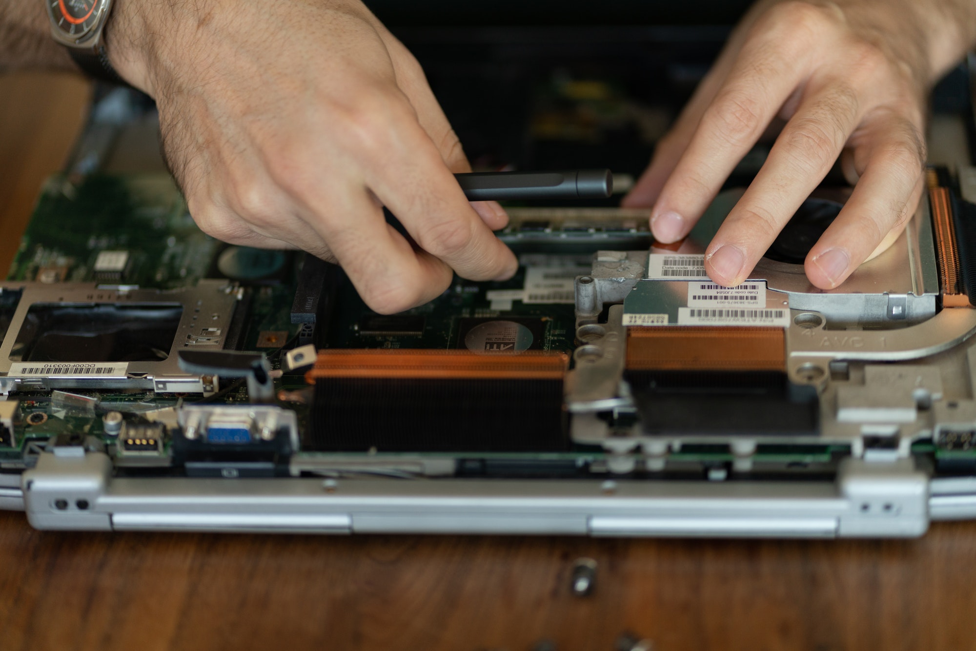 Laptop repair. Disassembled computer parts.